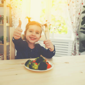 Picky Eaters Success - girl eating vegetables